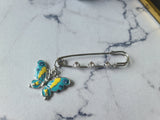 Rhinestone safety pin with dangling charm